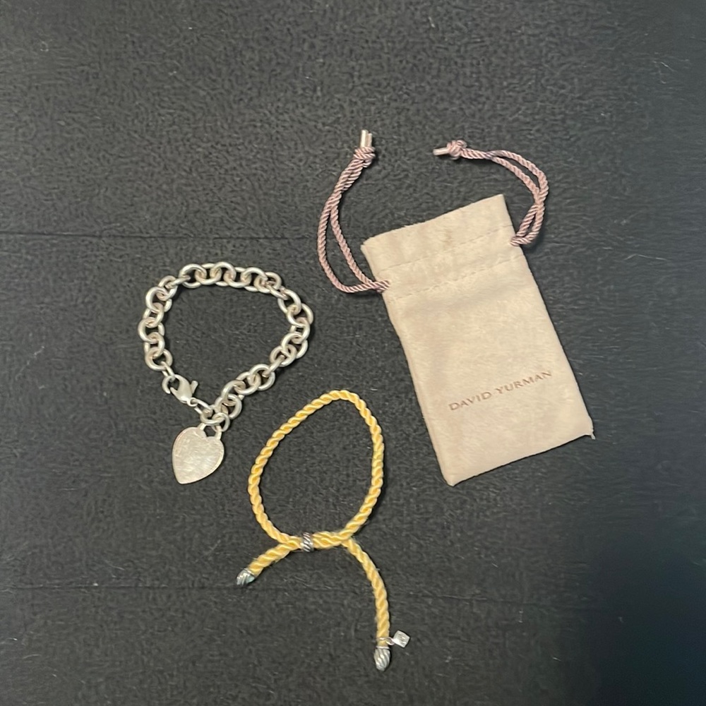 Tiffany’s charm bracelet and David Yurman rope bracelet